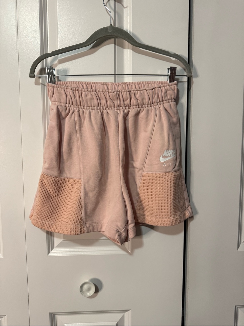 Nike Women’s Light Pink Athletic Shorts with Mesh Panels - size small